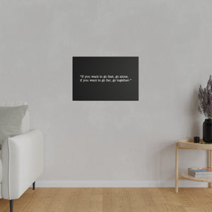 If you want to go fast, go alone. If you want to go far, go together. Wall Art | Horizontal Black Matte Canvas